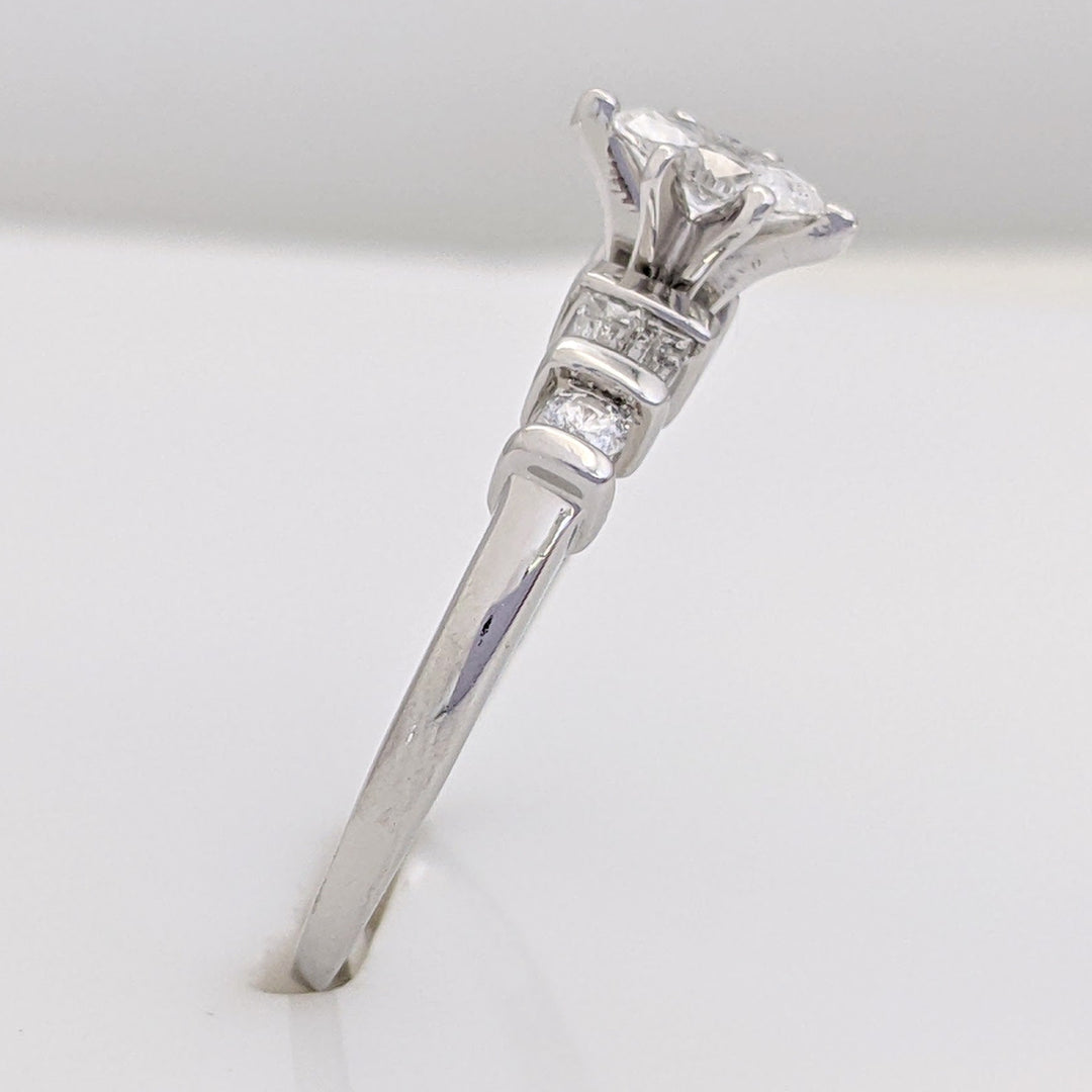 PLATINUM .41 CARAT TOTAL WEIGHT I1 F DIAMOND (1) MARQUISE CUT WITH (4) BAGUETTE CUT (2) ROUND ESTATE RING 4.0 GRAMS