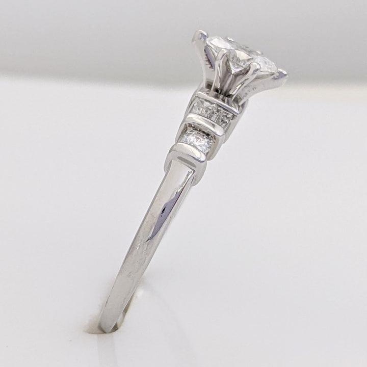 PLATINUM .41 CARAT TOTAL WEIGHT I1 F DIAMOND (1) MARQUISE CUT WITH (4) BAGUETTE CUT (2) ROUND ESTATE RING 4.0 GRAMS