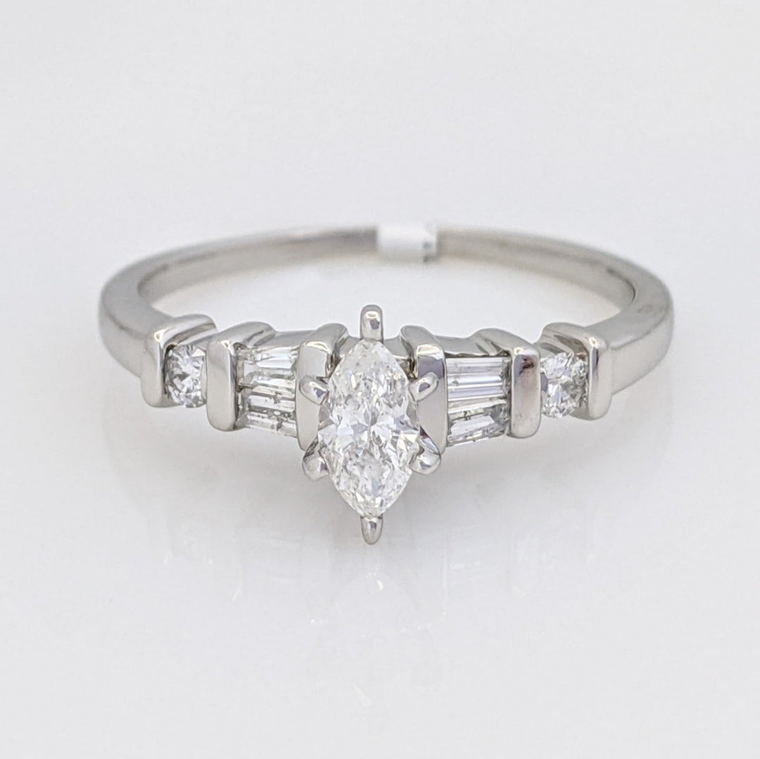 PLATINUM .41 CARAT TOTAL WEIGHT I1 F DIAMOND (1) MARQUISE CUT WITH (4) BAGUETTE CUT (2) ROUND ESTATE RING 4.0 GRAMS