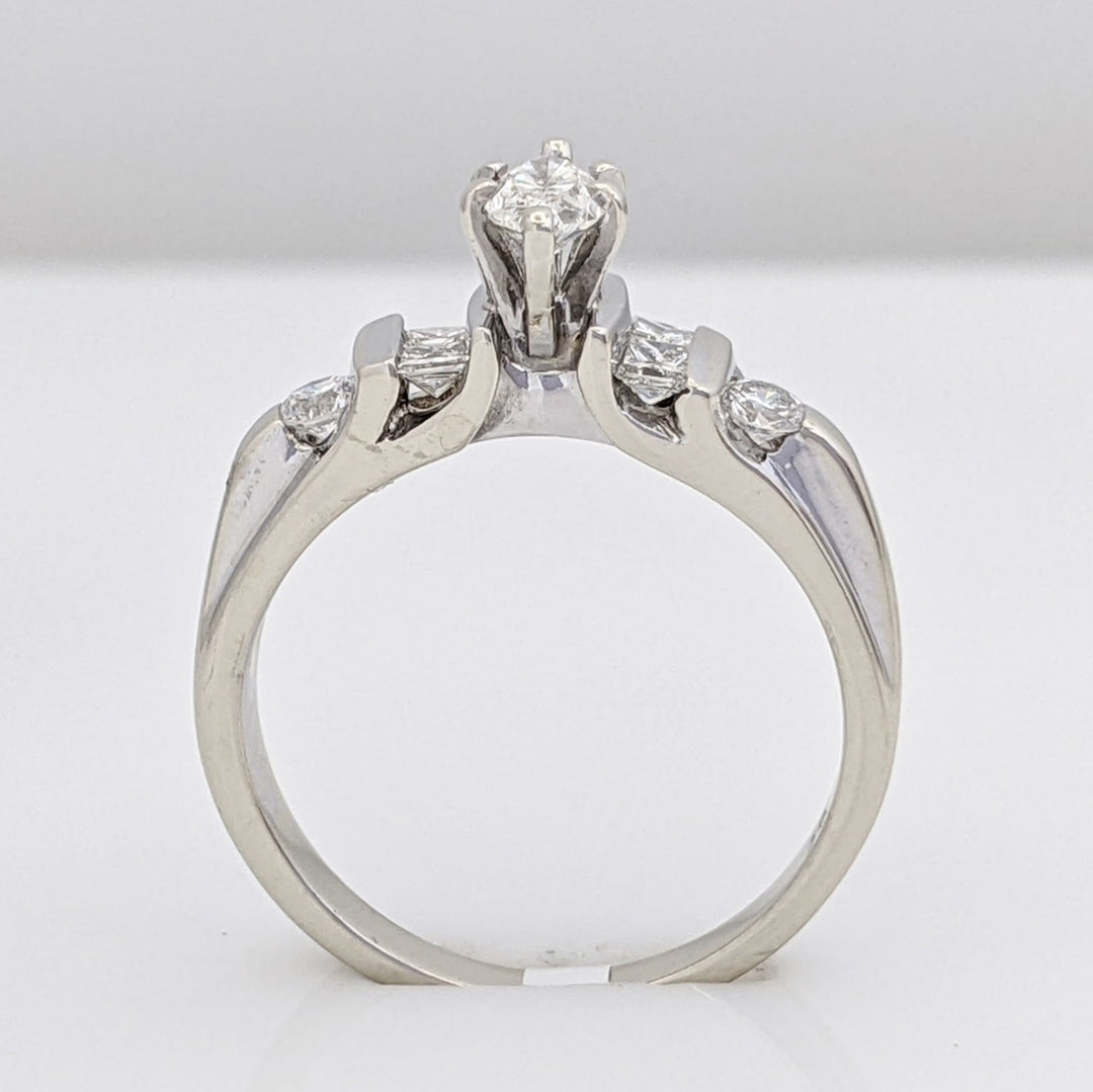 14KW .64 CARAT TOTAL WEIGHT I1 H DIAMOND MARQUISE CUT (1) PRINCESS CUT (4) ROUND (2) ESTATE RING 3.2 GRAMS