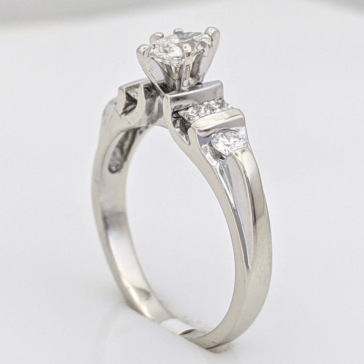 14KW .64 CARAT TOTAL WEIGHT I1 H DIAMOND MARQUISE CUT (1) PRINCESS CUT (4) ROUND (2) ESTATE RING 3.2 GRAMS