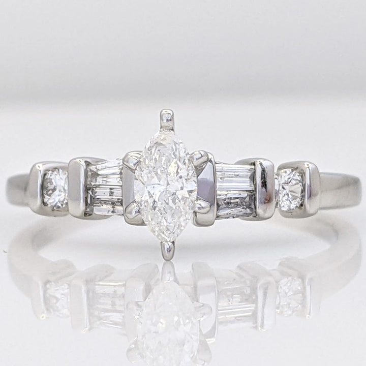 PLATINUM .41 CARAT TOTAL WEIGHT I1 F DIAMOND (1) MARQUISE CUT WITH (4) BAGUETTE CUT (2) ROUND ESTATE RING 4.0 GRAMS