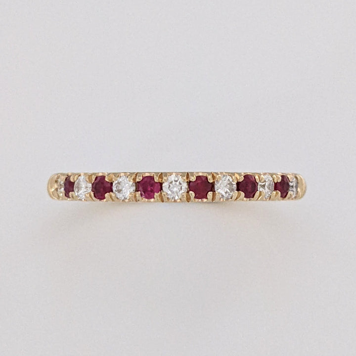 14K RUBY ROUND (6) WITH .17 DIAMOND TOTAL WEIGHT (7) ROUND ESTATE BAND 2.7 GRAMS
