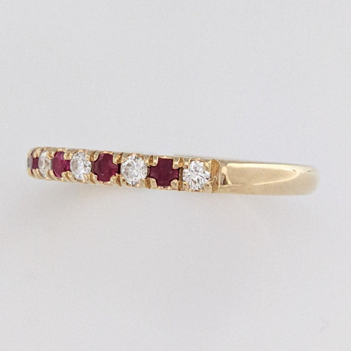 14K RUBY ROUND (6) WITH .17 DIAMOND TOTAL WEIGHT (7) ROUND ESTATE BAND 2.7 GRAMS