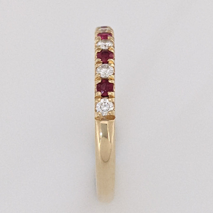 14K RUBY ROUND (6) WITH .17 DIAMOND TOTAL WEIGHT (7) ROUND ESTATE BAND 2.7 GRAMS