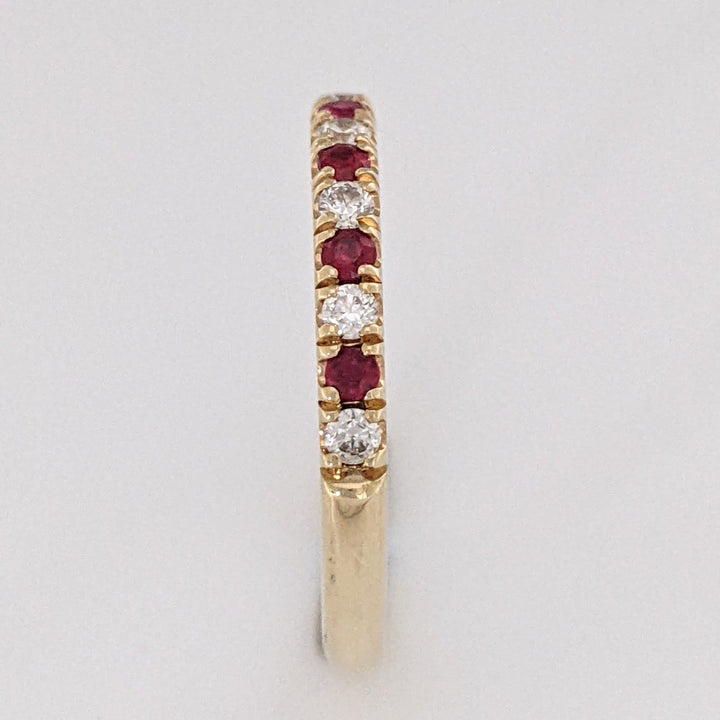 14K RUBY ROUND (6) WITH .17 DIAMOND TOTAL WEIGHT (7) ROUND ESTATE BAND 2.7 GRAMS