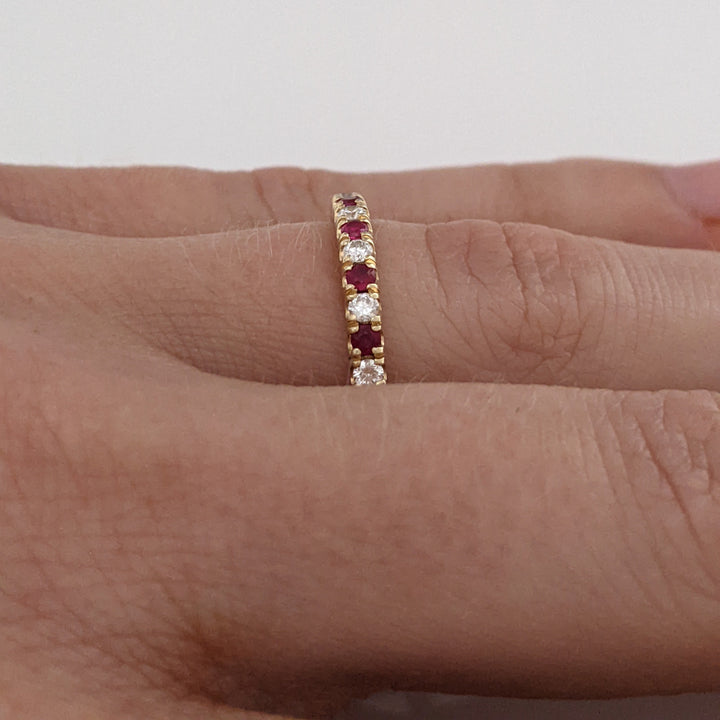 14K RUBY ROUND (6) WITH .17 DIAMOND TOTAL WEIGHT (7) ROUND ESTATE BAND 2.7 GRAMS