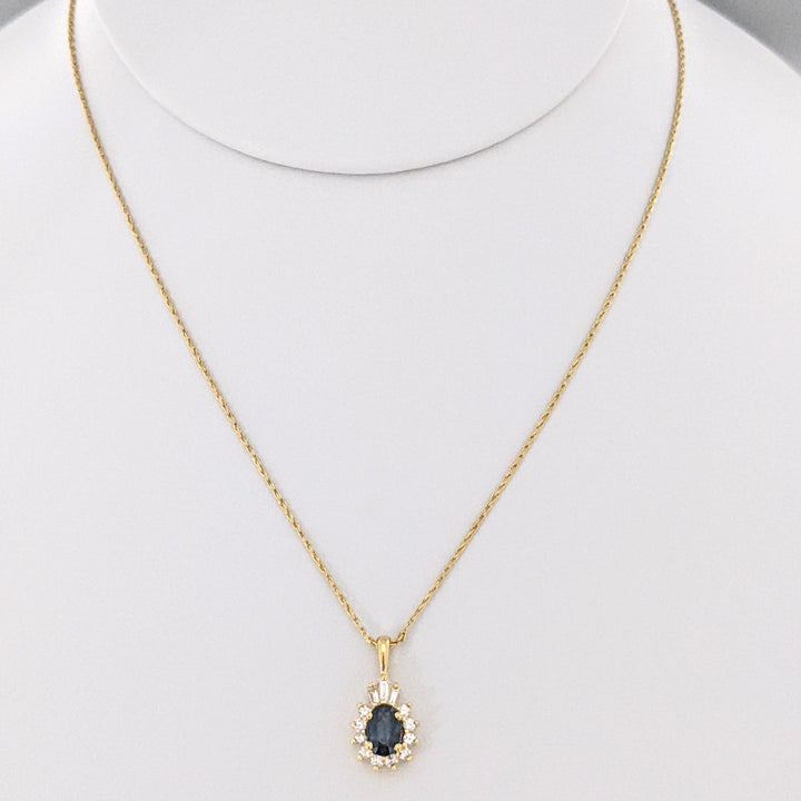 14K SAPPHIRE OVAL 4X5 WITH .25 DIAMOND TOTAL WEIGHT (3) BAGUETTE (10) ROUND ESTATE PENDANT & CHAIN 2.9 GRAMS