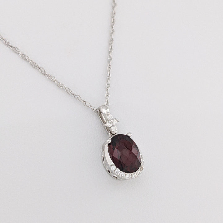 14K WHITE GARNET OVAL 1.32 CARAT TOTAL WITH .08 DIAMOND TOTAL WEIGHT ESTATE PENDANT & CHAIN 2.0 GRAMS