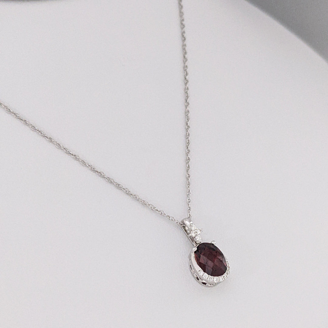14K WHITE GARNET OVAL 1.32 CARAT TOTAL WITH .08 DIAMOND TOTAL WEIGHT ESTATE PENDANT & CHAIN 2.0 GRAMS