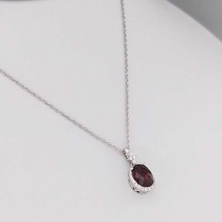 14K WHITE GARNET OVAL 1.32 CARAT TOTAL WITH .08 DIAMOND TOTAL WEIGHT ESTATE PENDANT & CHAIN 2.0 GRAMS