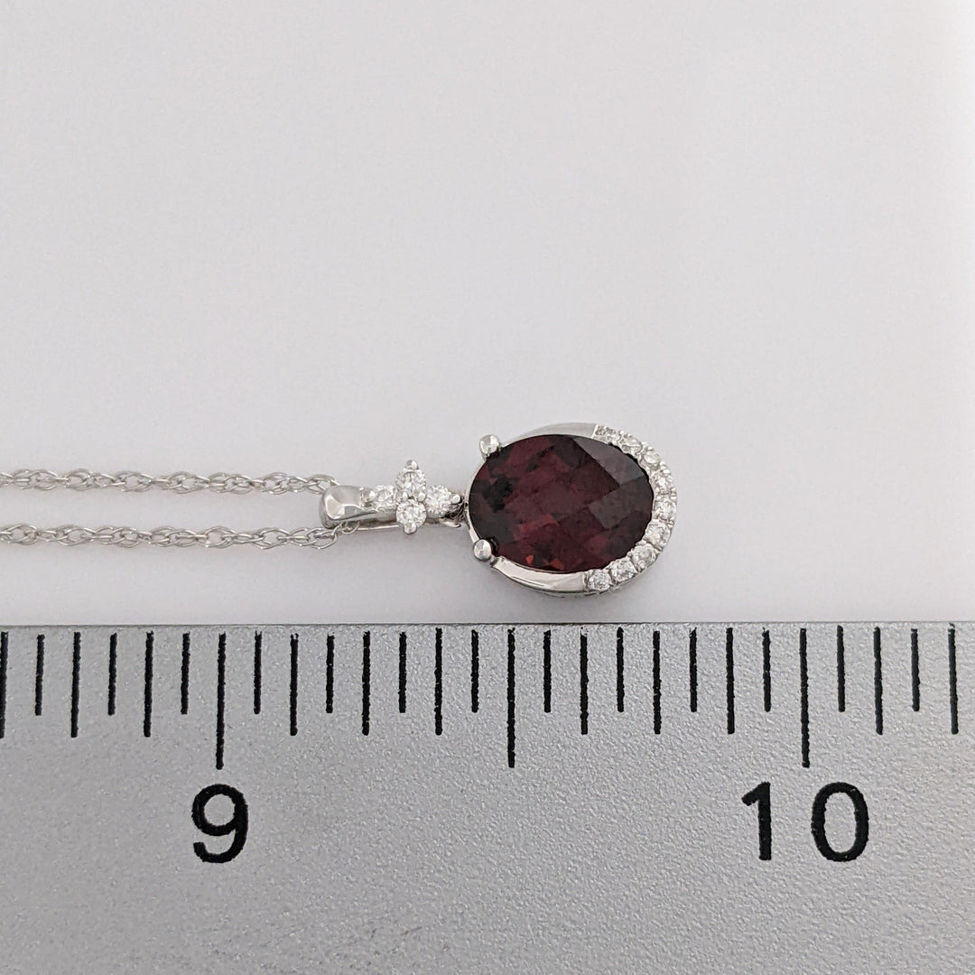 14K WHITE GARNET OVAL 1.32 CARAT TOTAL WITH .08 DIAMOND TOTAL WEIGHT ESTATE PENDANT & CHAIN 2.0 GRAMS