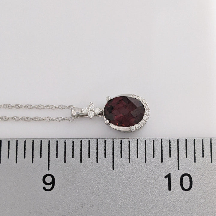 14K WHITE GARNET OVAL 1.32 CARAT TOTAL WITH .08 DIAMOND TOTAL WEIGHT ESTATE PENDANT & CHAIN 2.0 GRAMS