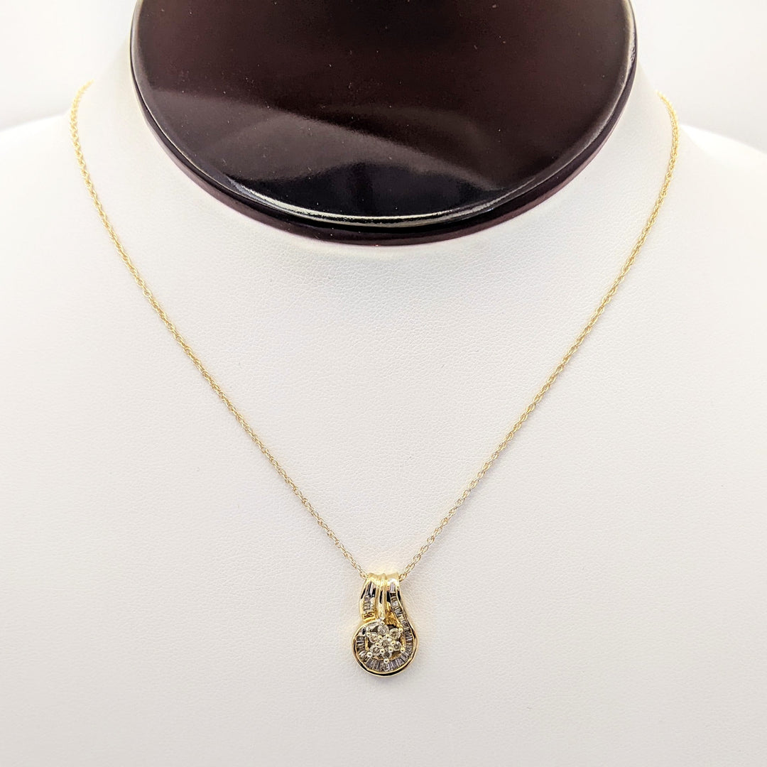 10K .50 CARAT TOTAL WEIGHT I1 K DIAMOND ROUND (7) BAGUETTE (28) ESTATE CLUSTER PENDANT & CHAIN 3.6 GRAMS