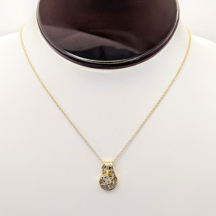 10K .50 CARAT TOTAL WEIGHT I1 K DIAMOND ROUND (7) BAGUETTE (28) ESTATE CLUSTER PENDANT & CHAIN 3.6 GRAMS