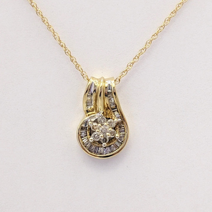 10K .50 CARAT TOTAL WEIGHT I1 K DIAMOND ROUND (7) BAGUETTE (28) ESTATE CLUSTER PENDANT & CHAIN 3.6 GRAMS