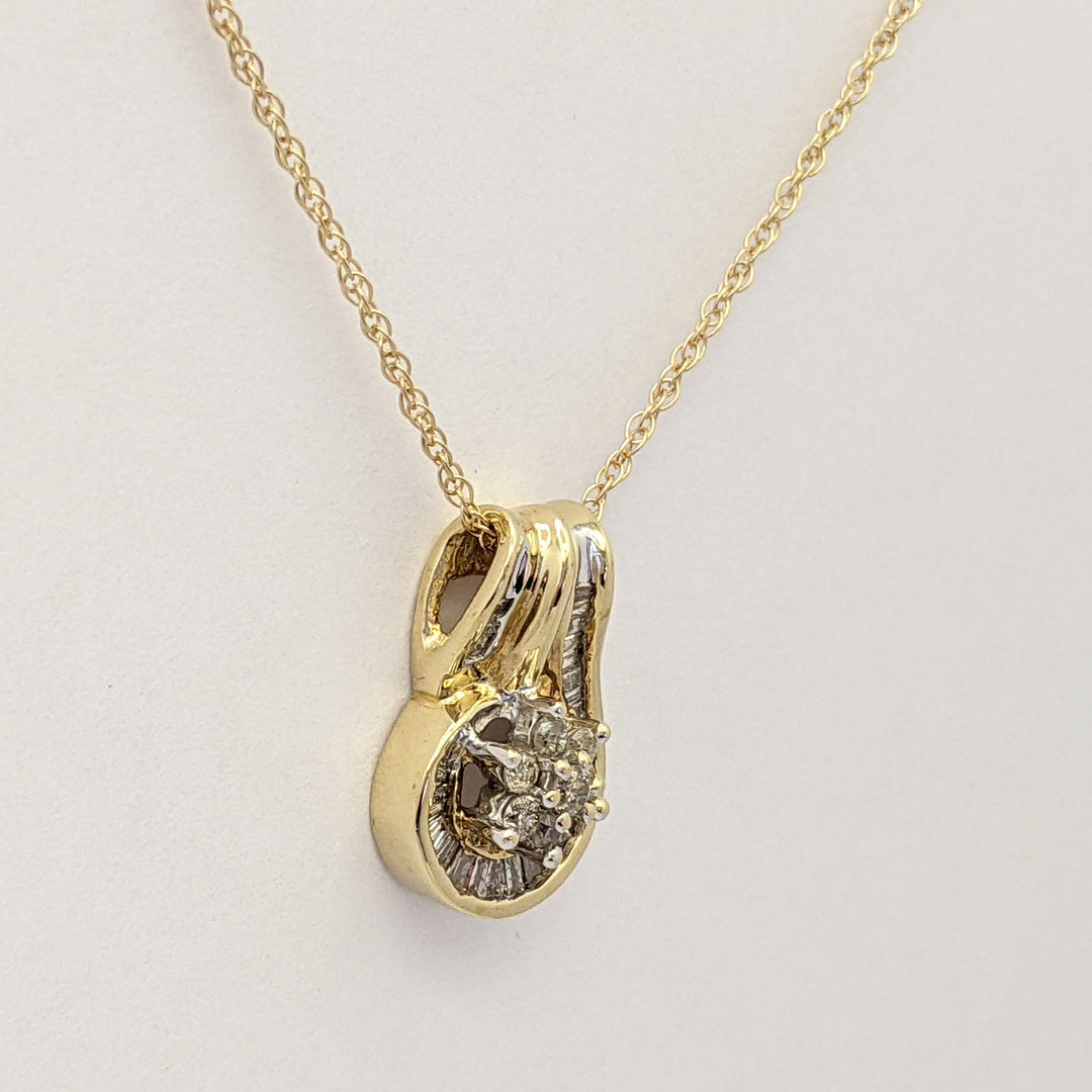 10K .50 CARAT TOTAL WEIGHT I1 K DIAMOND ROUND (7) BAGUETTE (28) ESTATE CLUSTER PENDANT & CHAIN 3.6 GRAMS