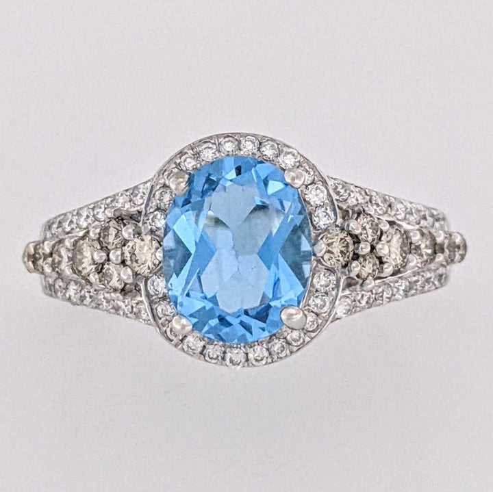 14K WHITE BLUE TOPAZ OVAL 7X9 WITH .66 DIAMOND TOTAL WEIGHT "LEVIAN" ESTATE RING 4.6 GRAMS