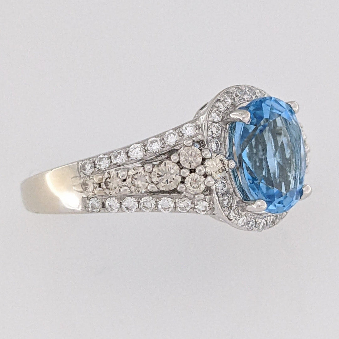14K WHITE BLUE TOPAZ OVAL 7X9 WITH .66 DIAMOND TOTAL WEIGHT "LEVIAN" ESTATE RING 4.6 GRAMS