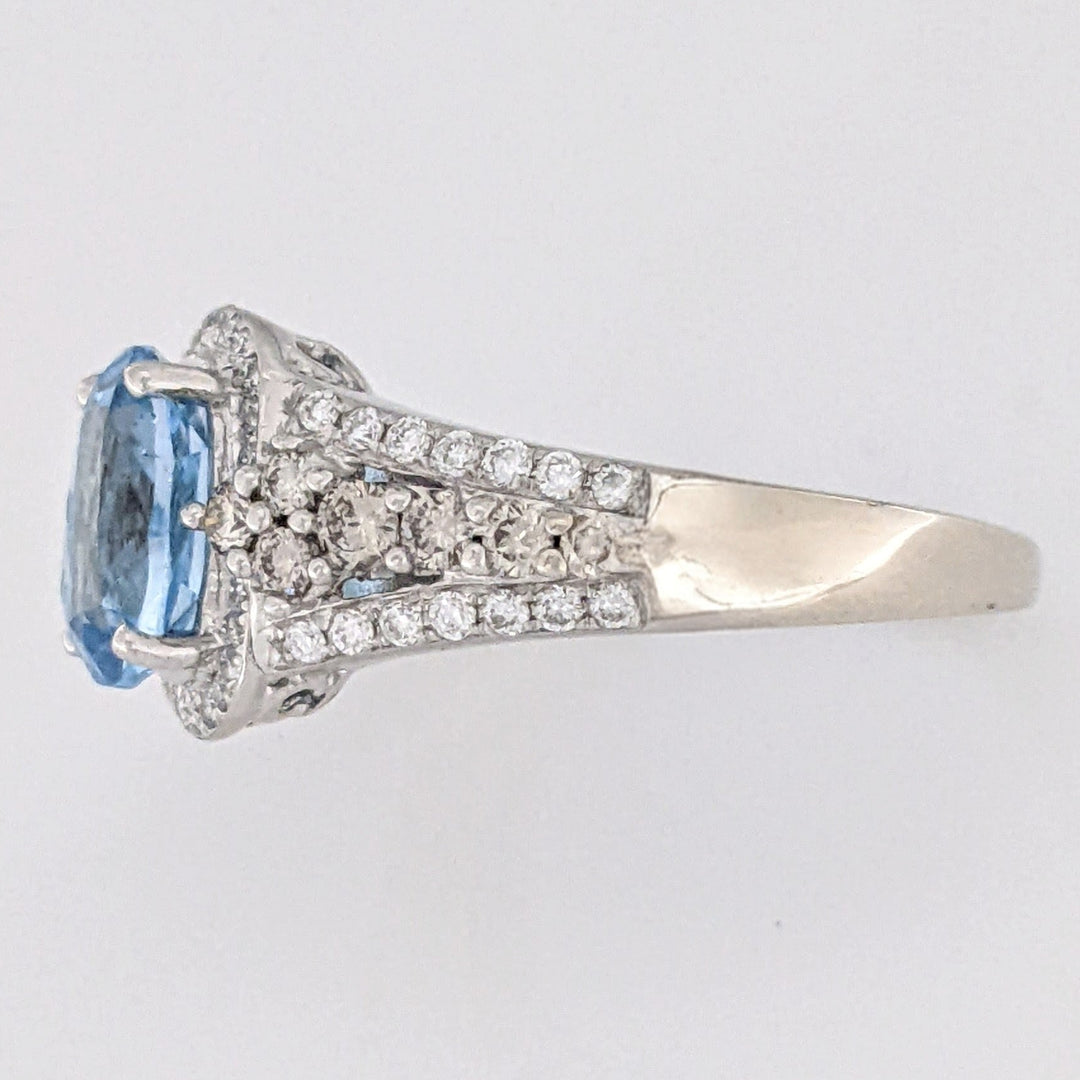 14K WHITE BLUE TOPAZ OVAL 7X9 WITH .66 DIAMOND TOTAL WEIGHT "LEVIAN" ESTATE RING 4.6 GRAMS