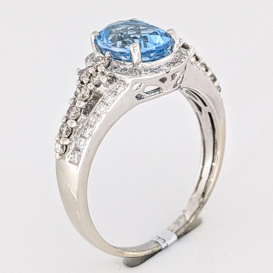 14K WHITE BLUE TOPAZ OVAL 7X9 WITH .66 DIAMOND TOTAL WEIGHT "LEVIAN" ESTATE RING 4.6 GRAMS