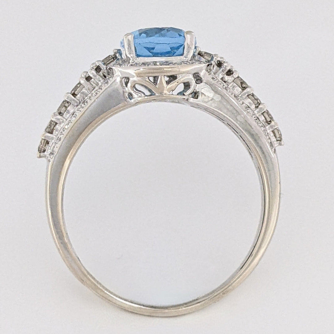 14K WHITE BLUE TOPAZ OVAL 7X9 WITH .66 DIAMOND TOTAL WEIGHT "LEVIAN" ESTATE RING 4.6 GRAMS