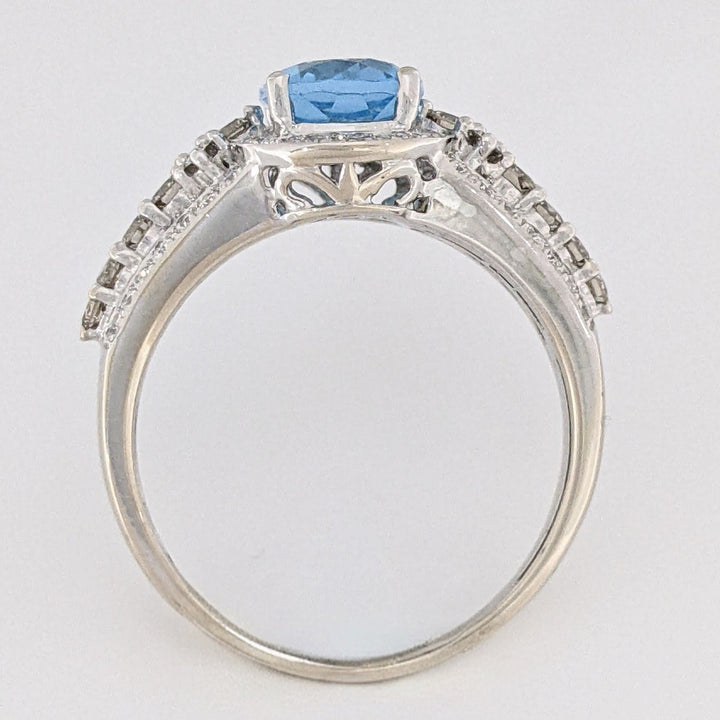 14K WHITE BLUE TOPAZ OVAL 7X9 WITH .66 DIAMOND TOTAL WEIGHT "LEVIAN" ESTATE RING 4.6 GRAMS
