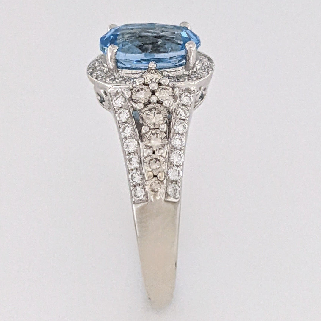 14K WHITE BLUE TOPAZ OVAL 7X9 WITH .66 DIAMOND TOTAL WEIGHT "LEVIAN" ESTATE RING 4.6 GRAMS