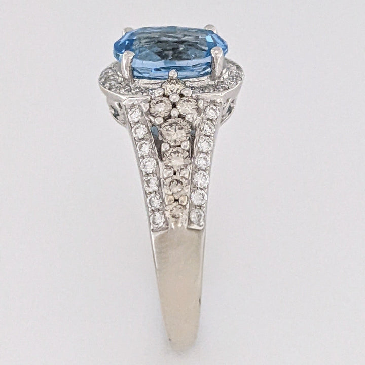 14K WHITE BLUE TOPAZ OVAL 7X9 WITH .66 DIAMOND TOTAL WEIGHT "LEVIAN" ESTATE RING 4.6 GRAMS