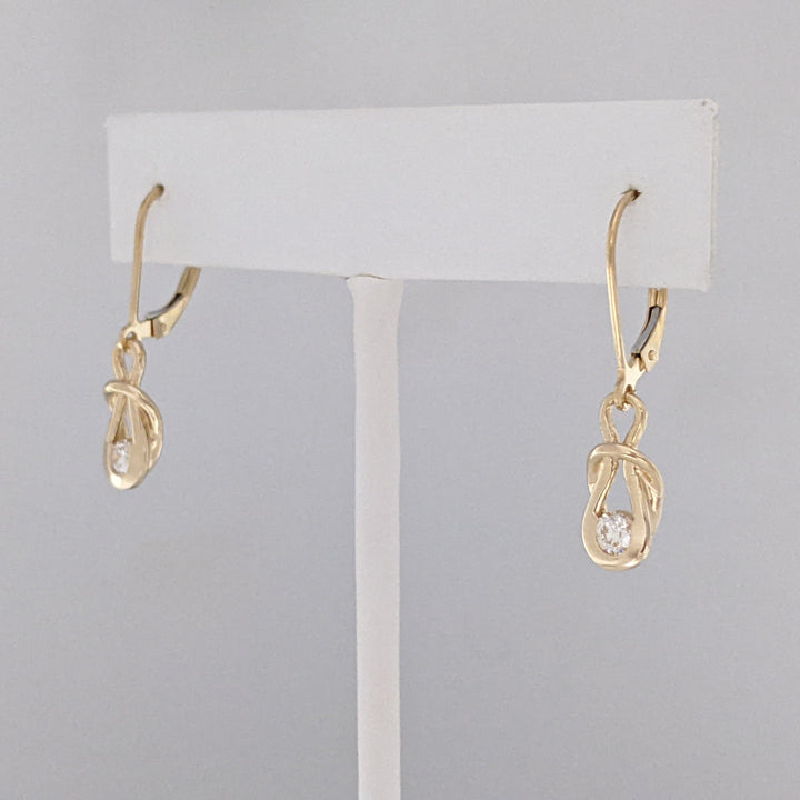14K .45 CARAT TOTAL WEIGHT SI2-I1 H-I DIAMOND ROUND (3) LOVE KNOT ESTATE PENDANT, CHAIN, AND EARRING SET