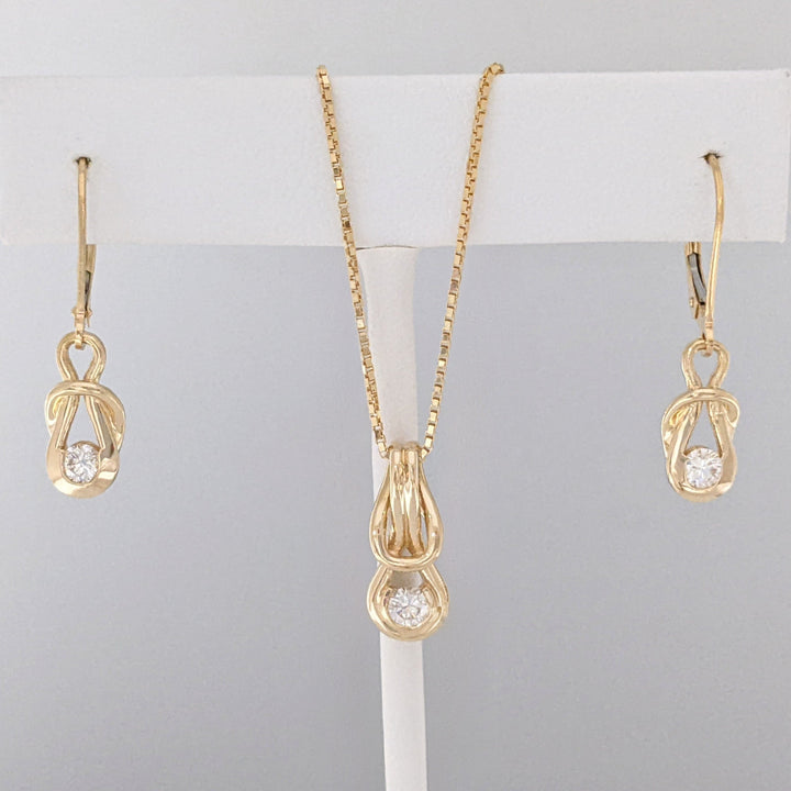 14K .45 CARAT TOTAL WEIGHT SI2-I1 H-I DIAMOND ROUND (3) LOVE KNOT ESTATE PENDANT, CHAIN, AND EARRING SET