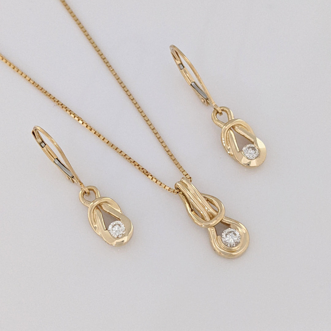 14K .45 CARAT TOTAL WEIGHT SI2-I1 H-I DIAMOND ROUND (3) LOVE KNOT ESTATE PENDANT, CHAIN, AND EARRING SET