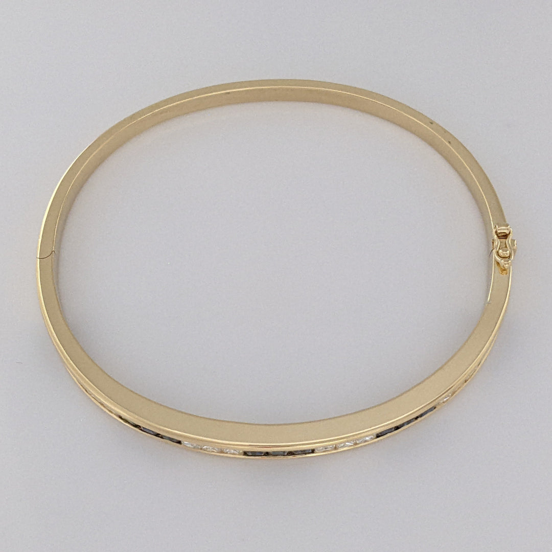 18K SAPPHIRE PRINCESS CUT (15) DIAMOND PRINCESS CUT (12) 2.5MM CHANNEL ESTATE BANGLE 18.2 GRAMS