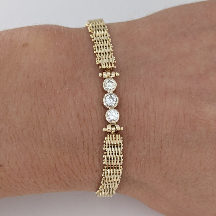 14K .36 CARAT TOTAL WEIGHT VS2 I-J DIAMOND ROUND (3) BEZEL ESTATE BRACELET 11.3 GRAMS