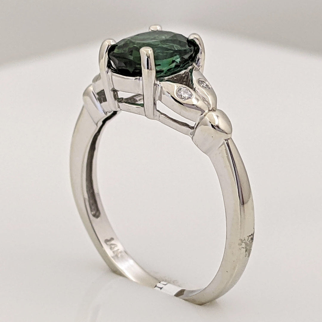 14K WHITE GREEN TOURMALINE OVAL 1.46 CARAT TOTAL WITH .04 DIAMOND TOTAL WEIGHT LEAF ESTATE RING 3.1 GRAMS