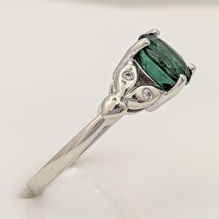 14K WHITE GREEN TOURMALINE OVAL 1.46 CARAT TOTAL WITH .04 DIAMOND TOTAL WEIGHT LEAF ESTATE RING 3.1 GRAMS