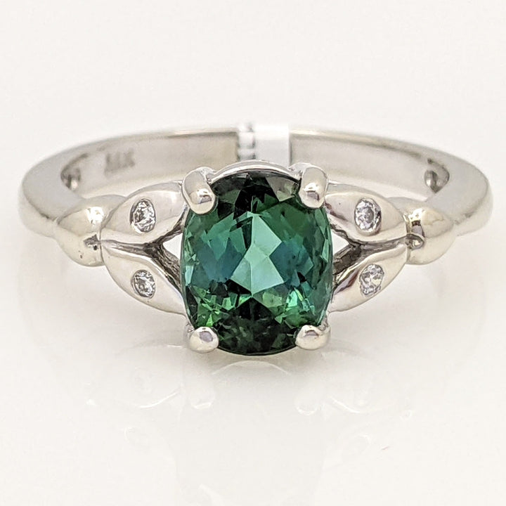 14K WHITE GREEN TOURMALINE OVAL 1.46 CARAT TOTAL WITH .04 DIAMOND TOTAL WEIGHT LEAF ESTATE RING 3.1 GRAMS