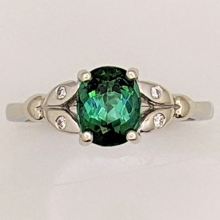 14K WHITE GREEN TOURMALINE OVAL 1.46 CARAT TOTAL WITH .04 DIAMOND TOTAL WEIGHT LEAF ESTATE RING 3.1 GRAMS