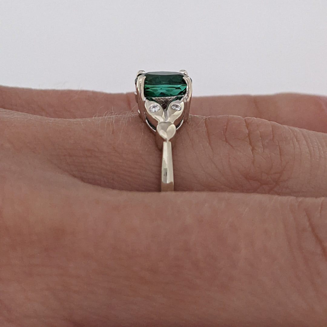 14K WHITE GREEN TOURMALINE OVAL 1.46 CARAT TOTAL WITH .04 DIAMOND TOTAL WEIGHT LEAF ESTATE RING 3.1 GRAMS