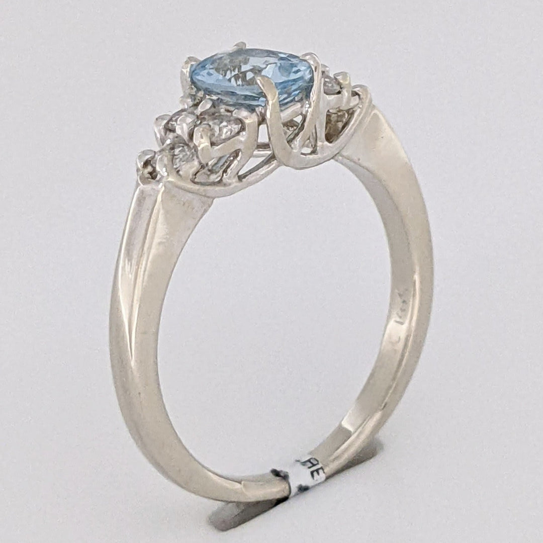 14K WHITE AQUAMARINE "A" OVAL 5X7 WITH .18 DIAMOND TOTAL WEIGHT (6) ROUND ESTATE RING 3.3 GRAMS