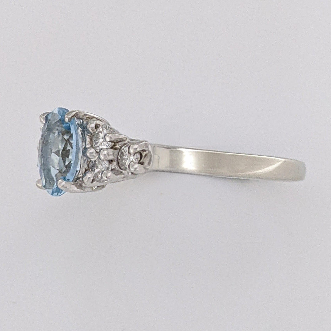 14K WHITE AQUAMARINE "A" OVAL 5X7 WITH .18 DIAMOND TOTAL WEIGHT (6) ROUND ESTATE RING 3.3 GRAMS