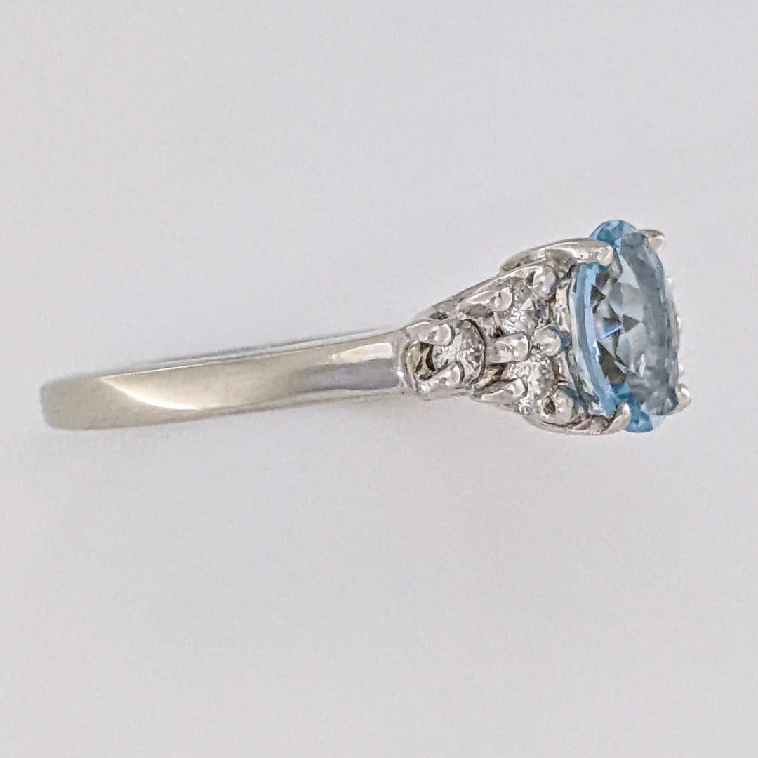 14K WHITE AQUAMARINE "A" OVAL 5X7 WITH .18 DIAMOND TOTAL WEIGHT (6) ROUND ESTATE RING 3.3 GRAMS