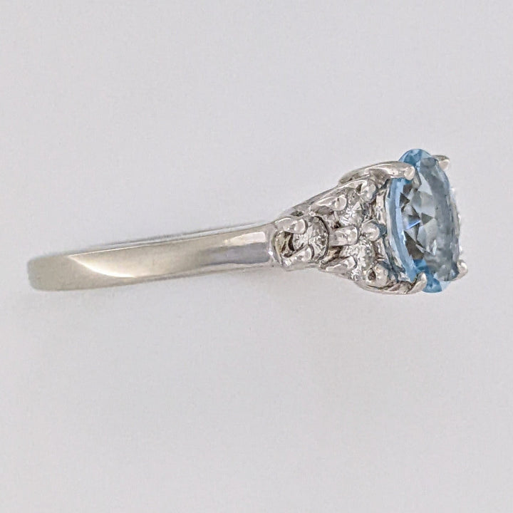 14K WHITE AQUAMARINE "A" OVAL 5X7 WITH .18 DIAMOND TOTAL WEIGHT (6) ROUND ESTATE RING 3.3 GRAMS