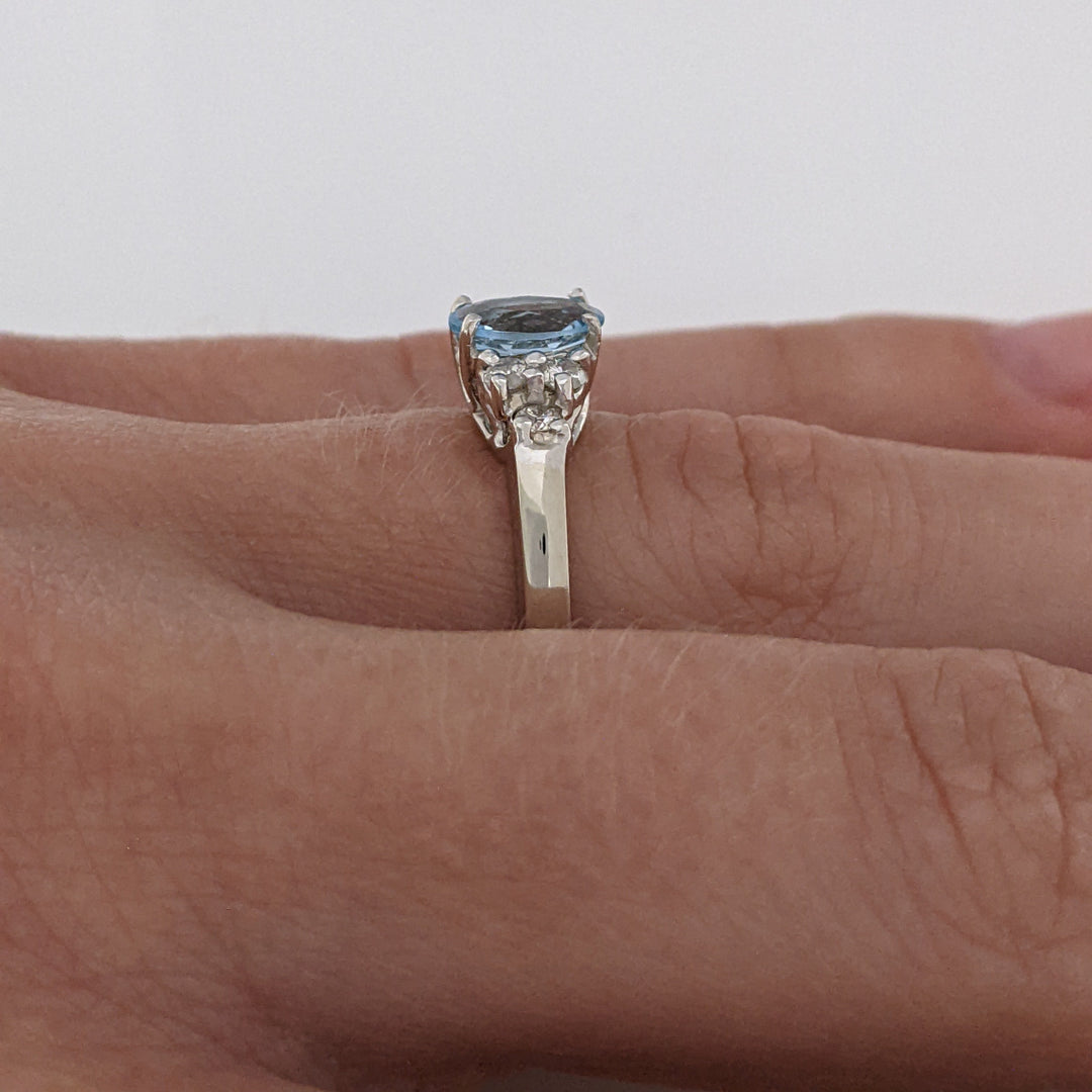 14K WHITE AQUAMARINE "A" OVAL 5X7 WITH .18 DIAMOND TOTAL WEIGHT (6) ROUND ESTATE RING 3.3 GRAMS