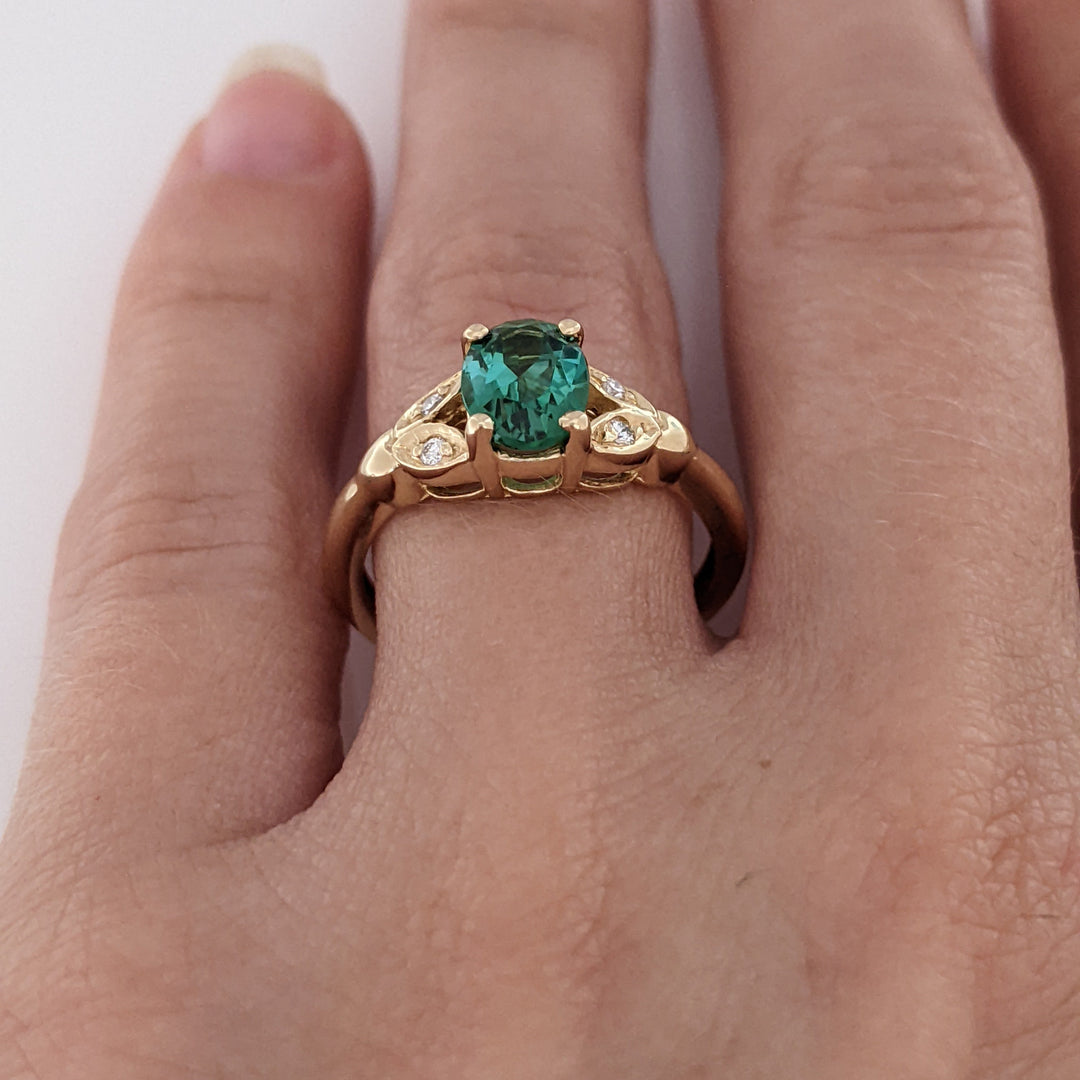14K GREEN TOURMALINE 1.01 CARAT TOTAL WITH .04 DIAMOND TOTAL WEIGHT LEAF ESTATE RING 2.8 GRAMS