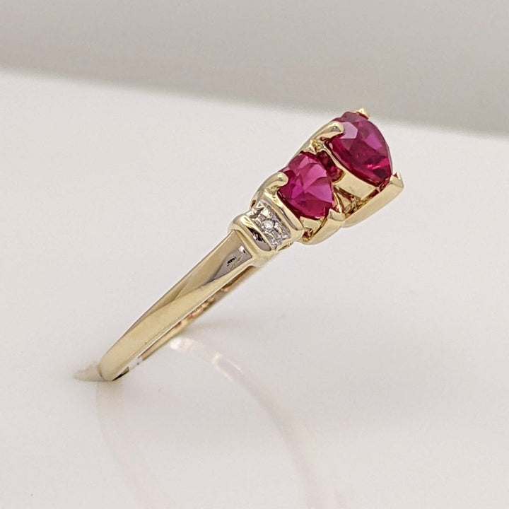 10K RED STONE HEART (3) WITH MELEE ESTATE RING 1.9 GRAMS