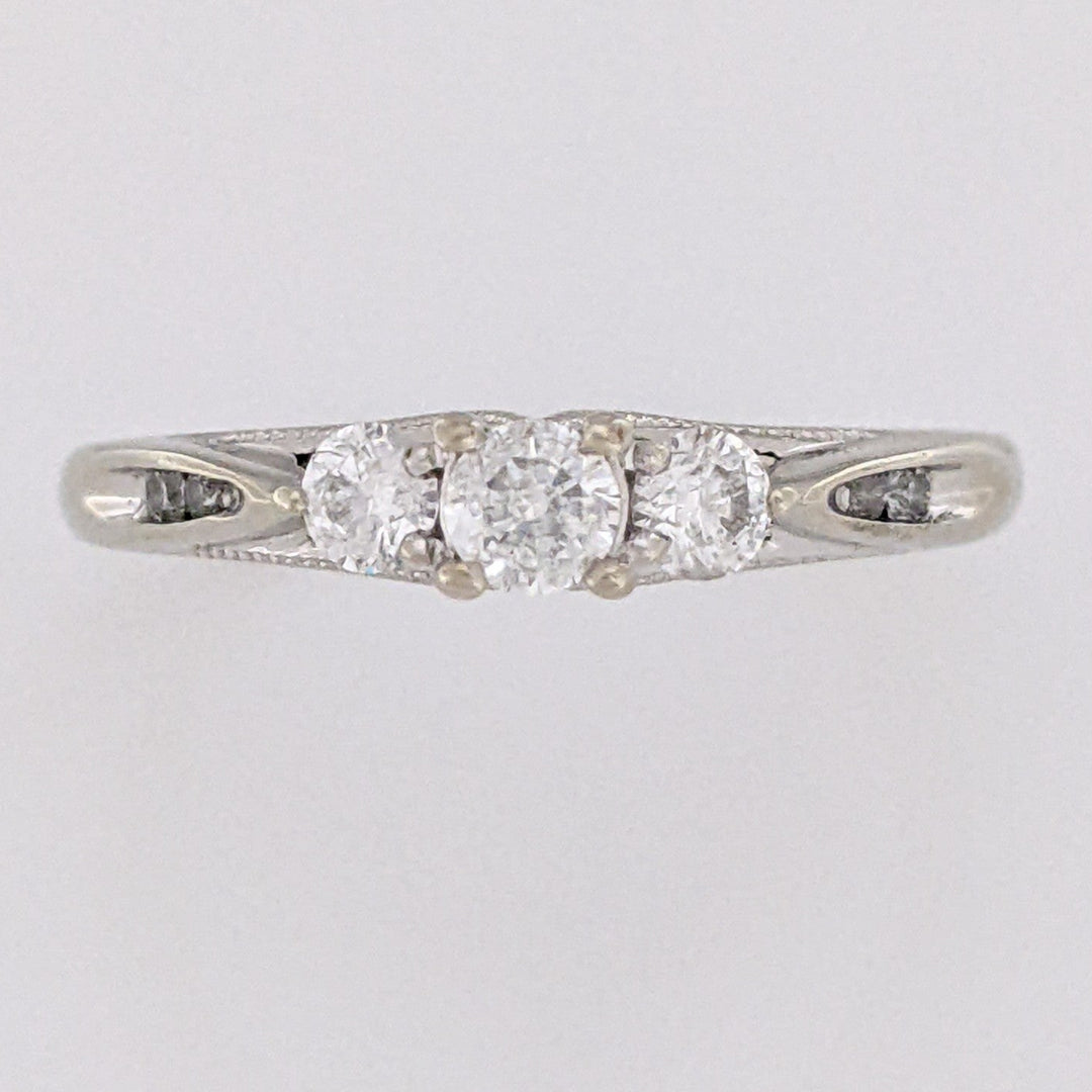 10K WHITE .32 CARAT TOTAL WEIGHT I1 H DIAMOND ROUND (7) ESTATE TRINITY RING 2.0 GRAMS