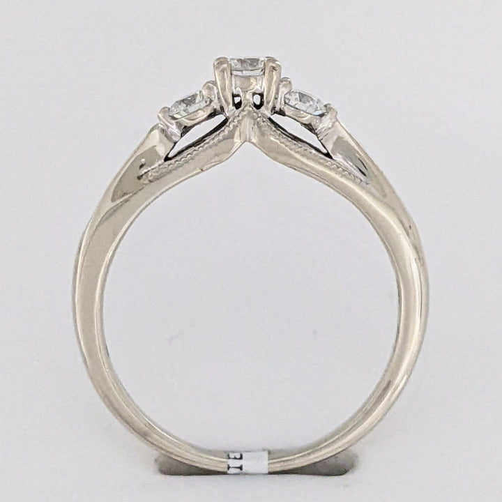 10K WHITE .32 CARAT TOTAL WEIGHT I1 H DIAMOND ROUND (7) ESTATE TRINITY RING 2.0 GRAMS