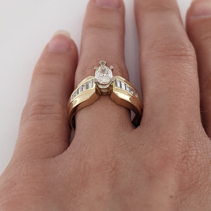 14K .97 CARAT TOTAL WEIGHT SI1 I DIAMOND PEAR (1) BAGUETTE (10) ESTATE RING 6.1 GRAMS