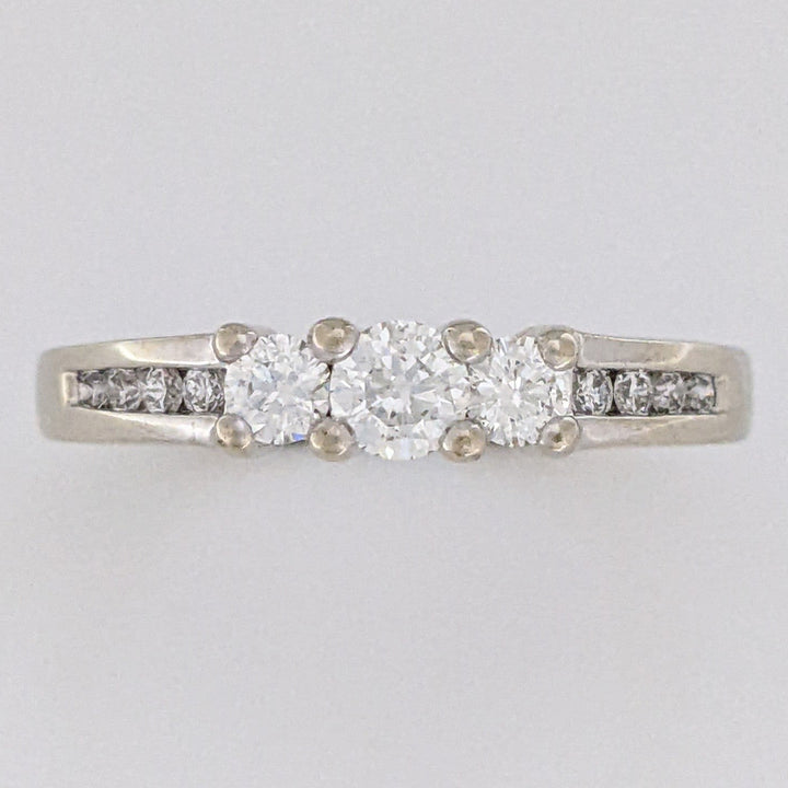 14K WHITE .47 CARAT TOTAL WEIGHT SI2 J DIAMOND ROUND (11) ESTATE TRINITY RING 4.3 GRAMS